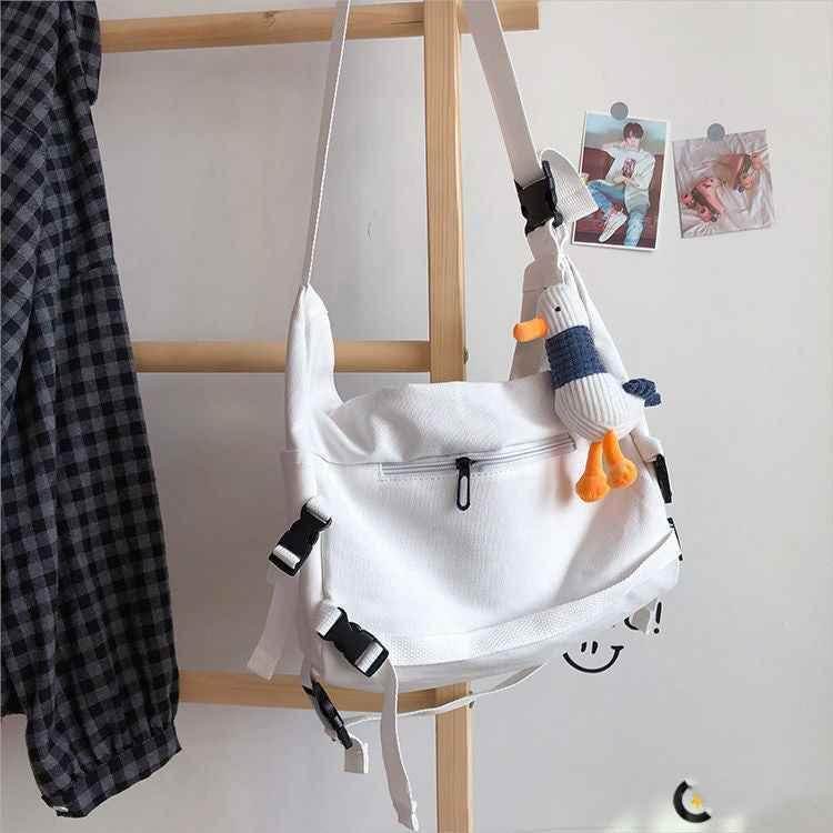Ins Japanese Harajuku Dark Fan Can Tooling Canvas Bag Female Korean Wild Pure Color Student One-Shoulder Messenger Bag J MuddyStock