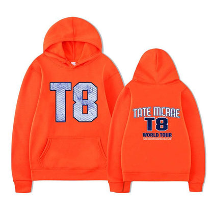 Tate McRae Fleece Hoodie For Men And Women Orange with white text MuddyStock