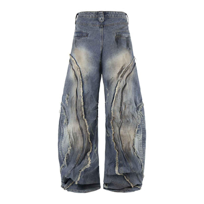 Deconstructing frayed washed loose jeans for men and women | MuddyStock Originals