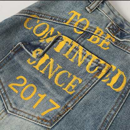 Letter printed curved knife jeans for men | MuddyStock Originals