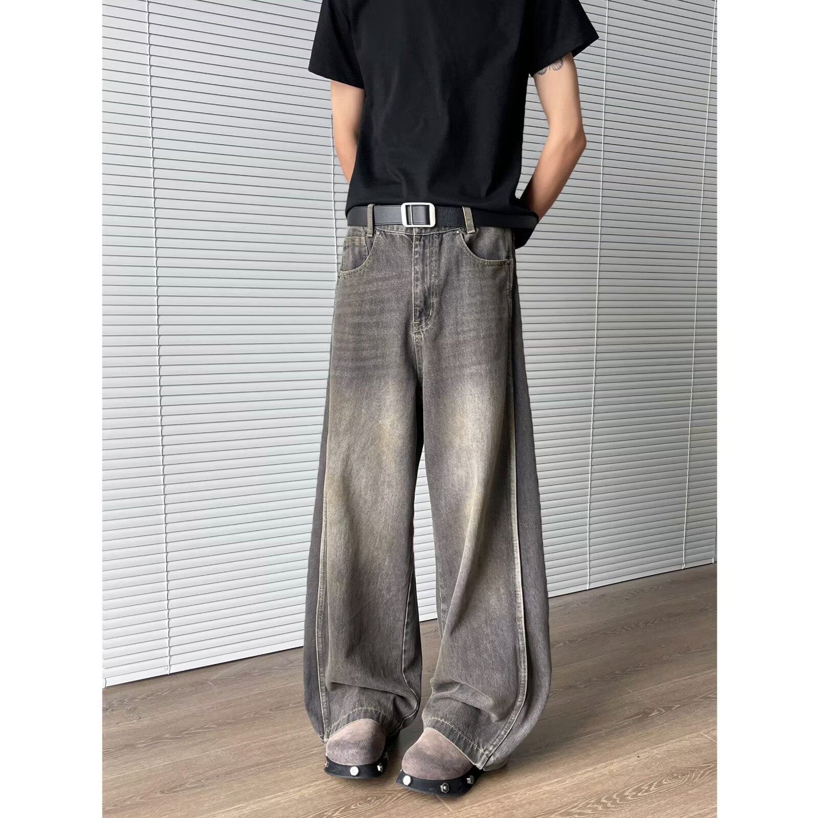 Deconstructed and spliced washed curved knife jeans for men | MuddyStock Originals MuddyStock