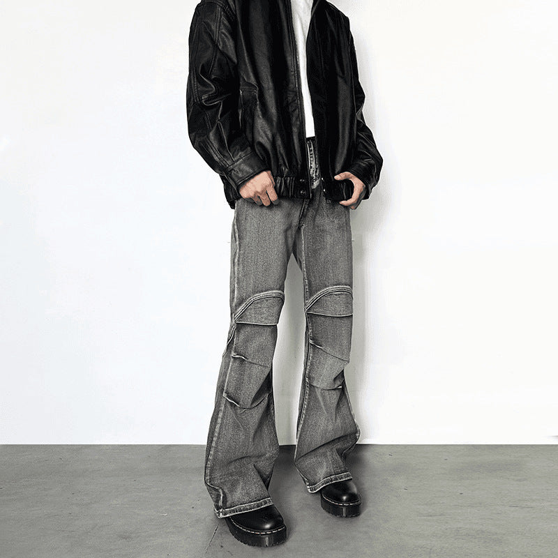 Vintage washed distressed jeans with pleats