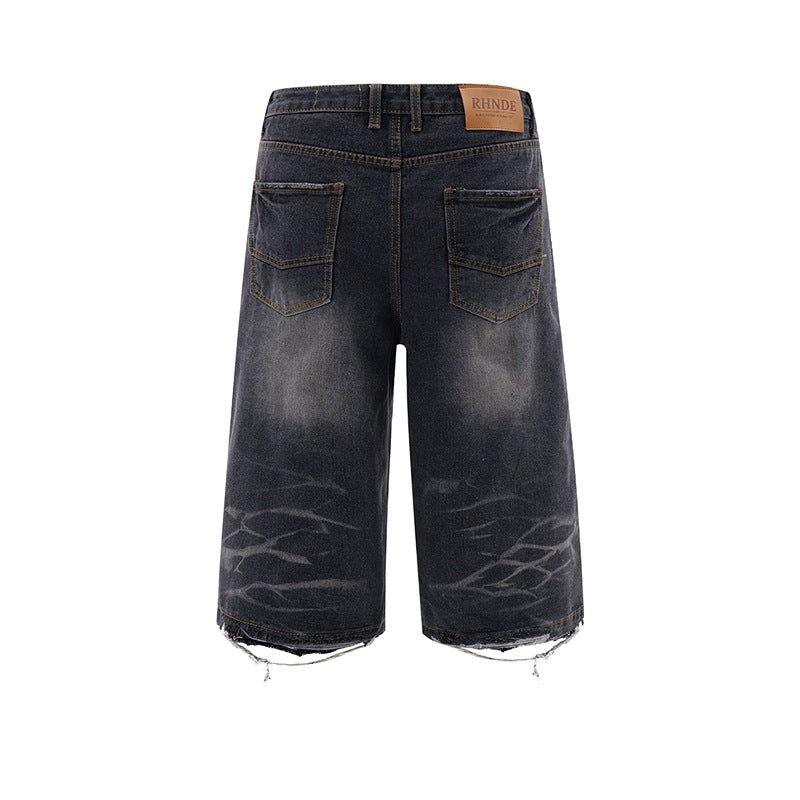 Loose silhouette washed and worn straight denim shorts