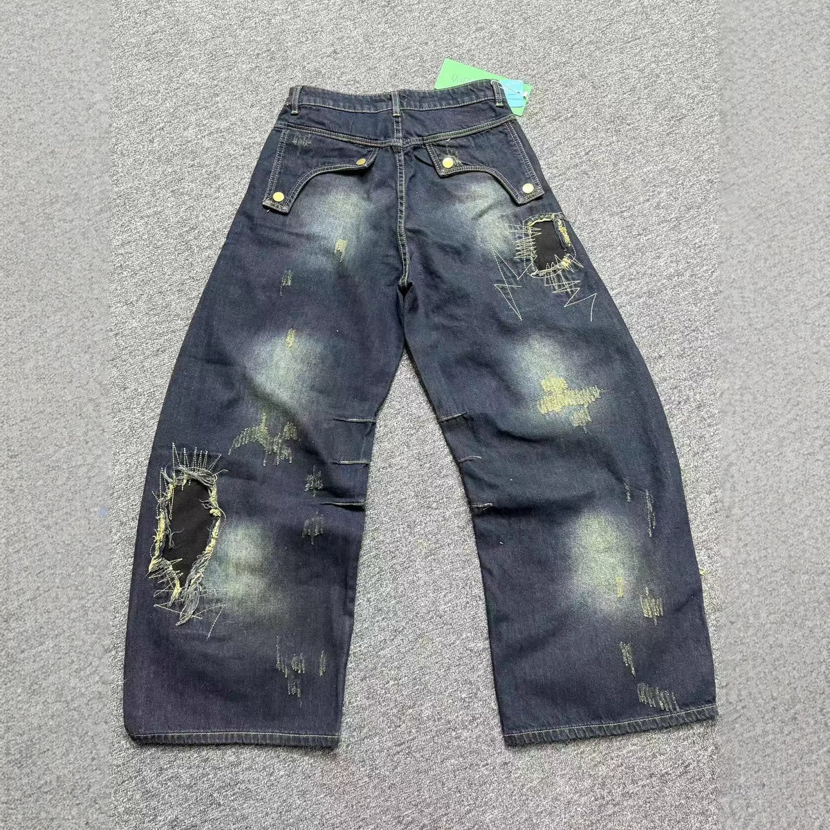 Washed patch curved knife jeans for women | MuddyStock Originals