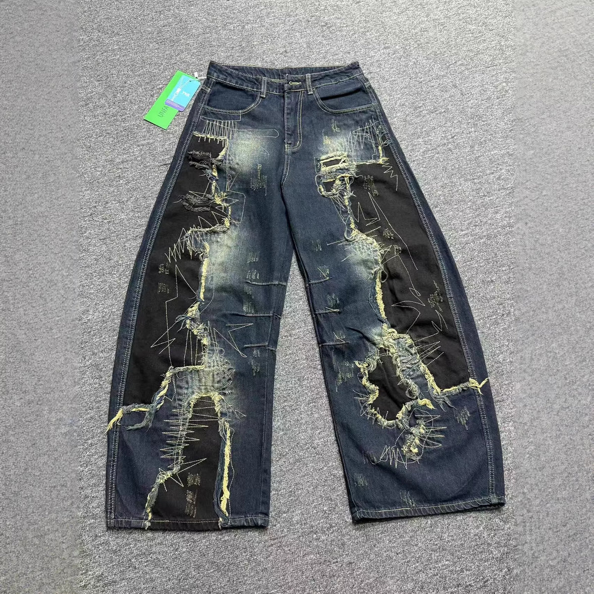 Washed patch curved knife jeans for women | MuddyStock Originals