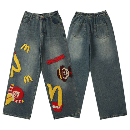 Retro Washed Denim Trousers with Cartoon Embroidery For Men And Women | MuddyStock Originals